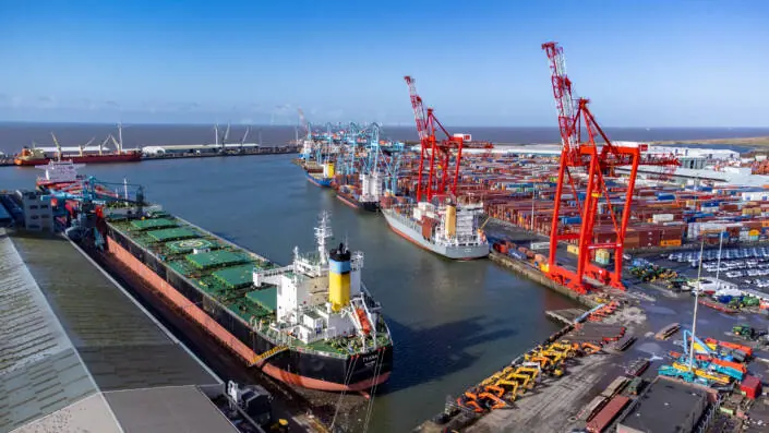Liverpool docks with ship and cranes