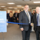 Associates of Cape Cod's President and CEO Dr. A.J. Meuse and Councillor Tony Brennan, Knowsley Council’s Cabinet Member for Regeneration and Economic Development at ribbon cutting for ACCI at Academy Business Park, Knowsley
