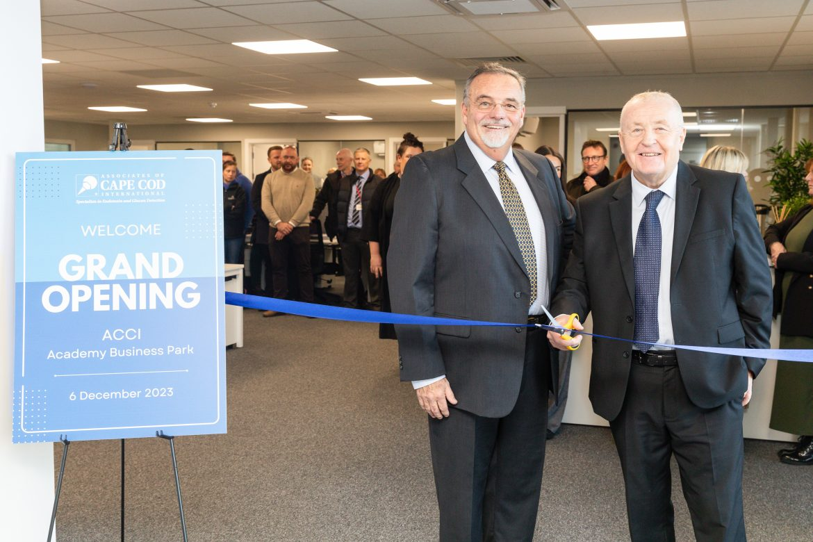 Associates of Cape Cod's President and CEO Dr. A.J. Meuse and Councillor Tony Brennan, Knowsley Council’s Cabinet Member for Regeneration and Economic Development at ribbon cutting for ACCI at Academy Business Park, Knowsley