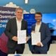 Liverpool City Region Mayor Steve Rotheram and ARIC CEO Alois Krtil at the signing of an MOU in Hamburg to develop a trans European supercluster